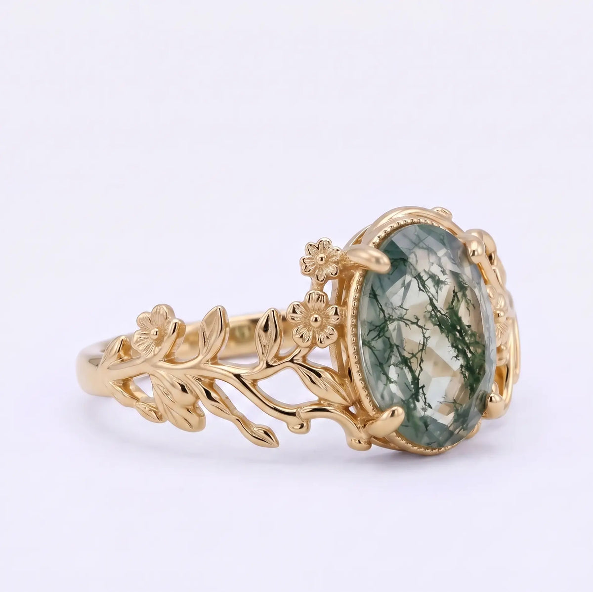 Right angle of floral botanical moss agate ring with organic openwork band