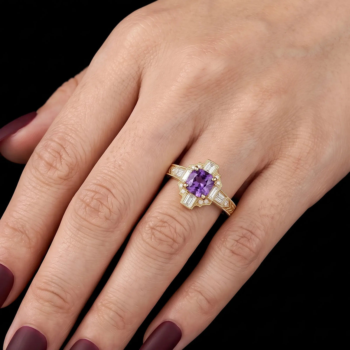 Vintage June birthstone cushion alexandrite engagement ring worn on hand in yellow gold

 Copy