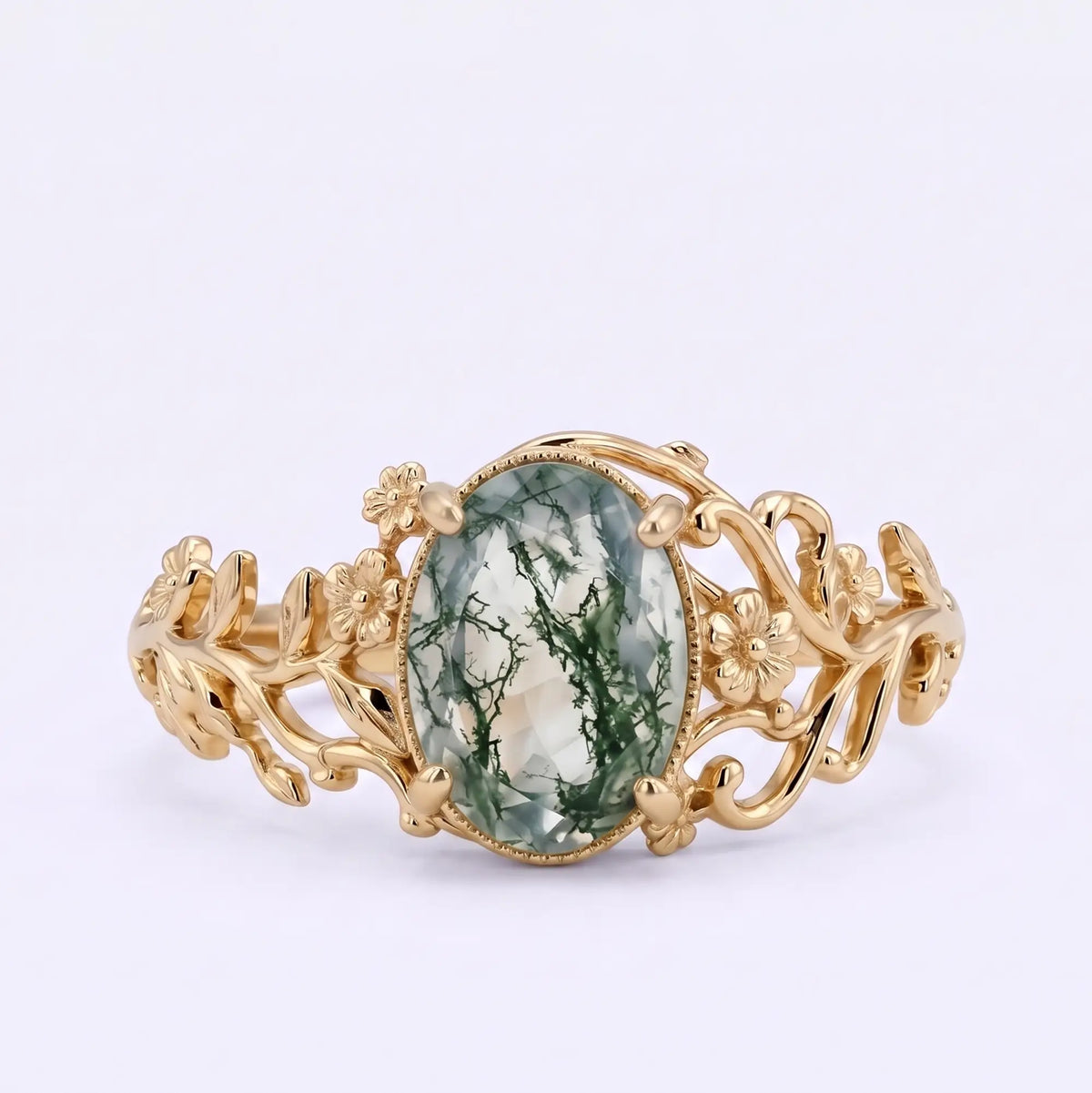 Oval moss agate botanical vine engagement ring with floral openwork in yellow gold