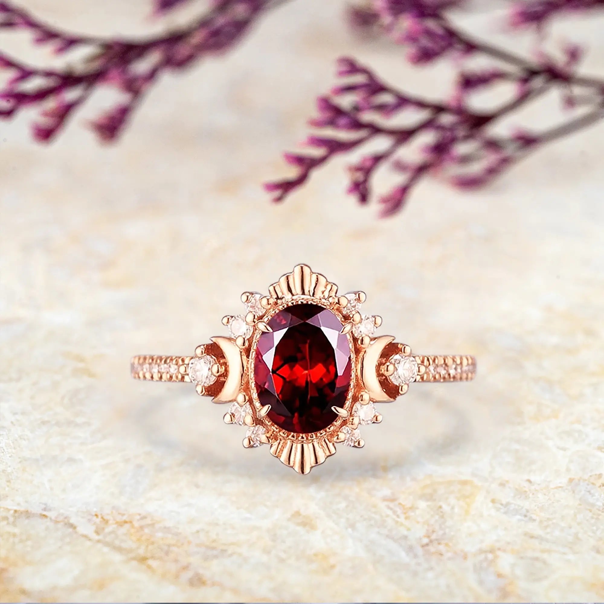 Garnet engagement ring in rose gold with moon and filigree detailing orleone jewelry