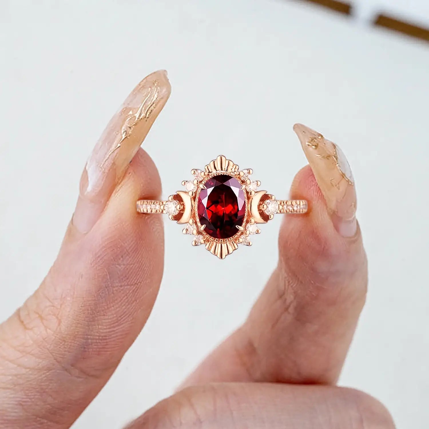 Garnet engagement ring in rose gold with moon and filigree detailing for women promise gift