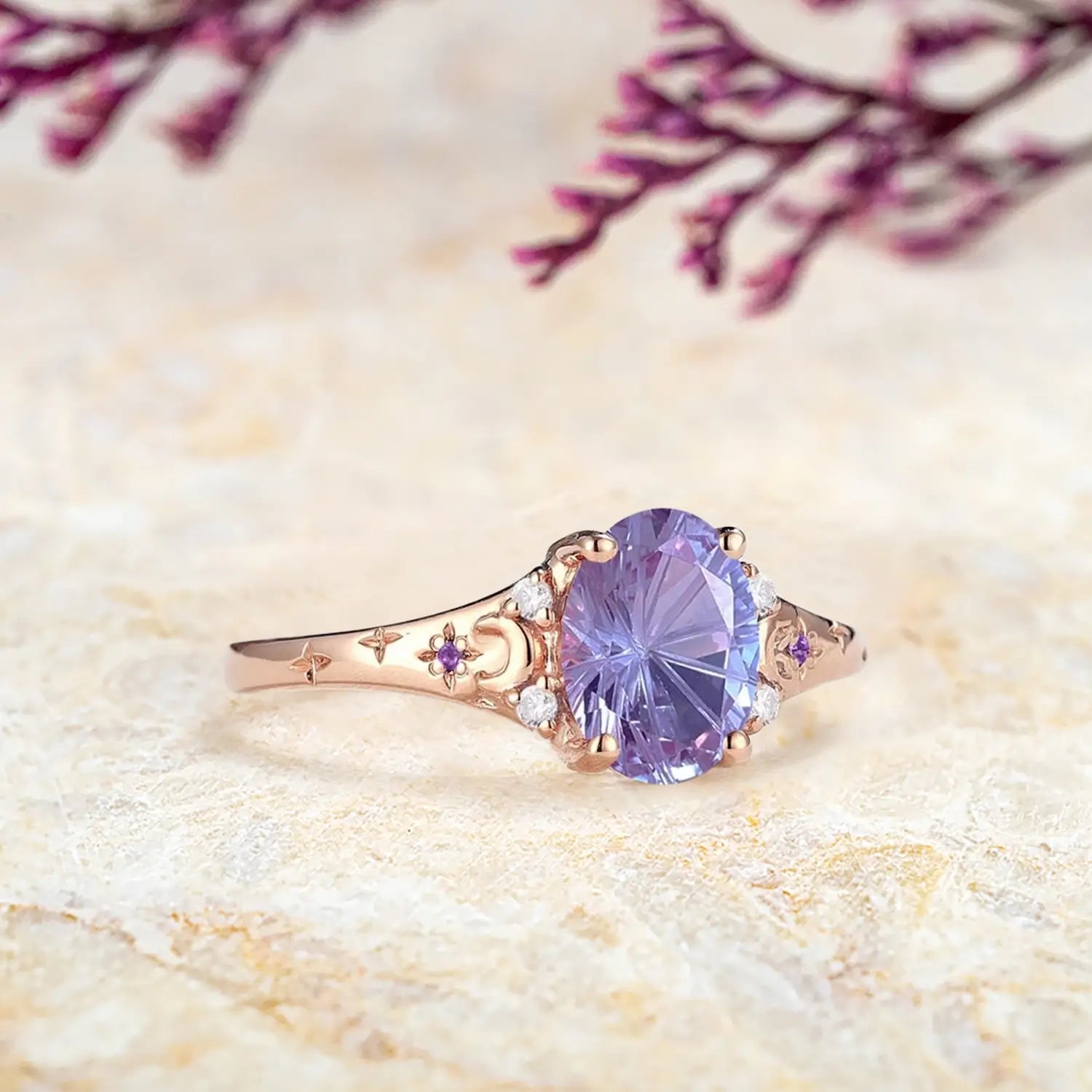 Oval firework cut alexandrite ring with moon and star side design