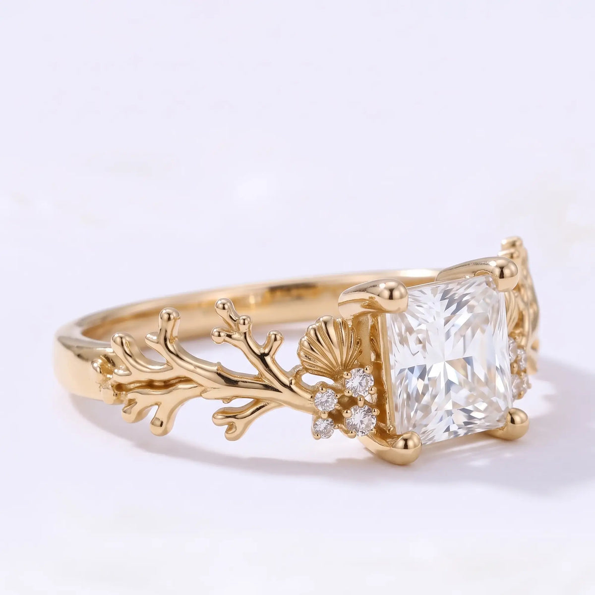 Ocean inspired coral engagement ring with round moissanite accents