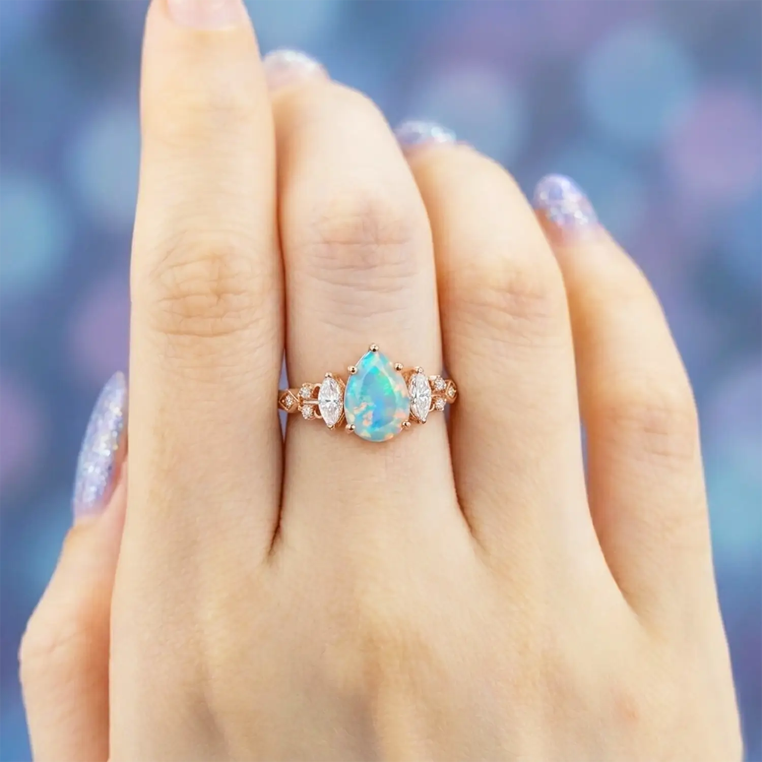 october birthstone opal ring pear cut with moissanite accents