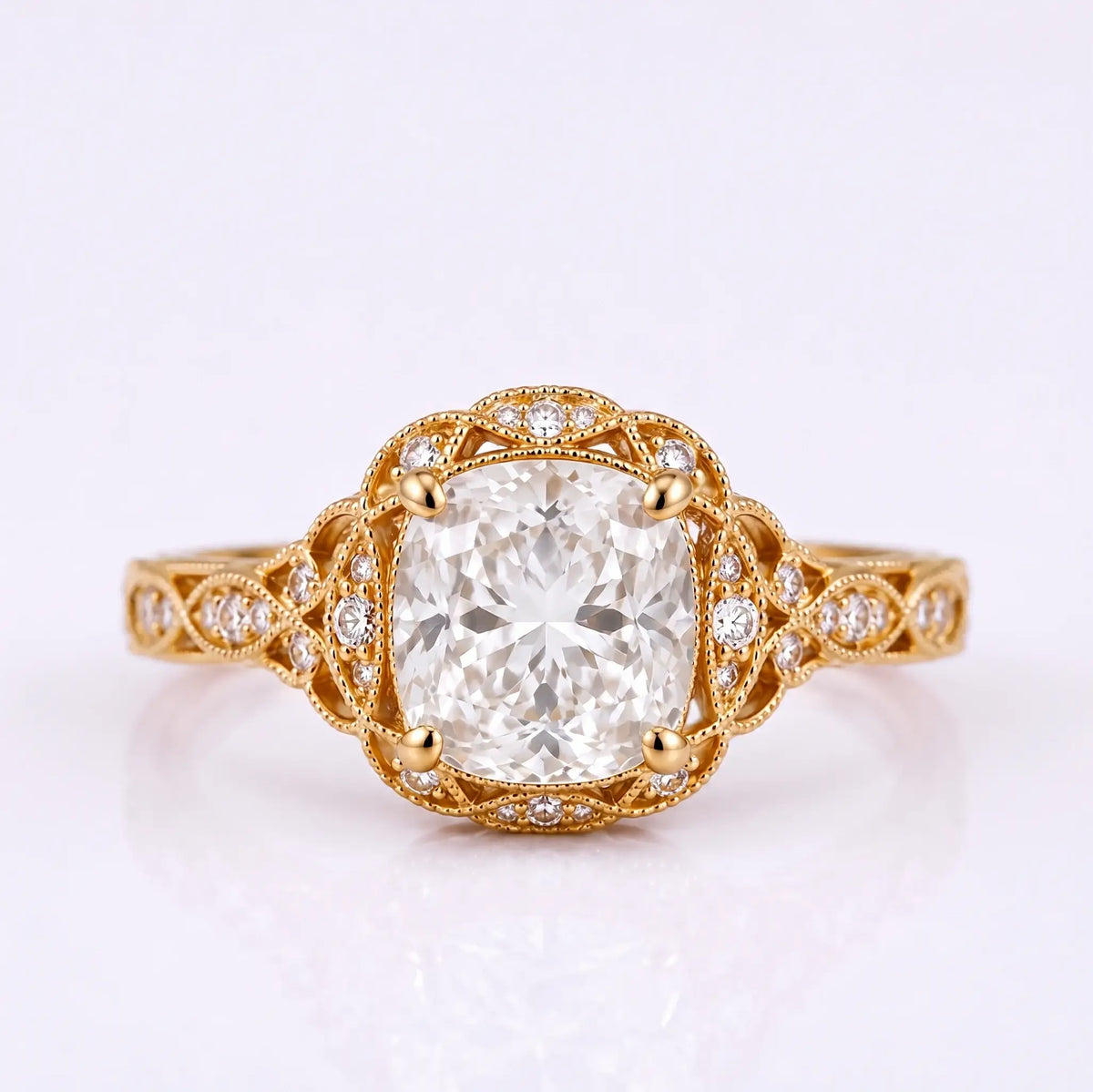 Vintage cushion cut moissanite halo engagement ring with milgrain detailing
